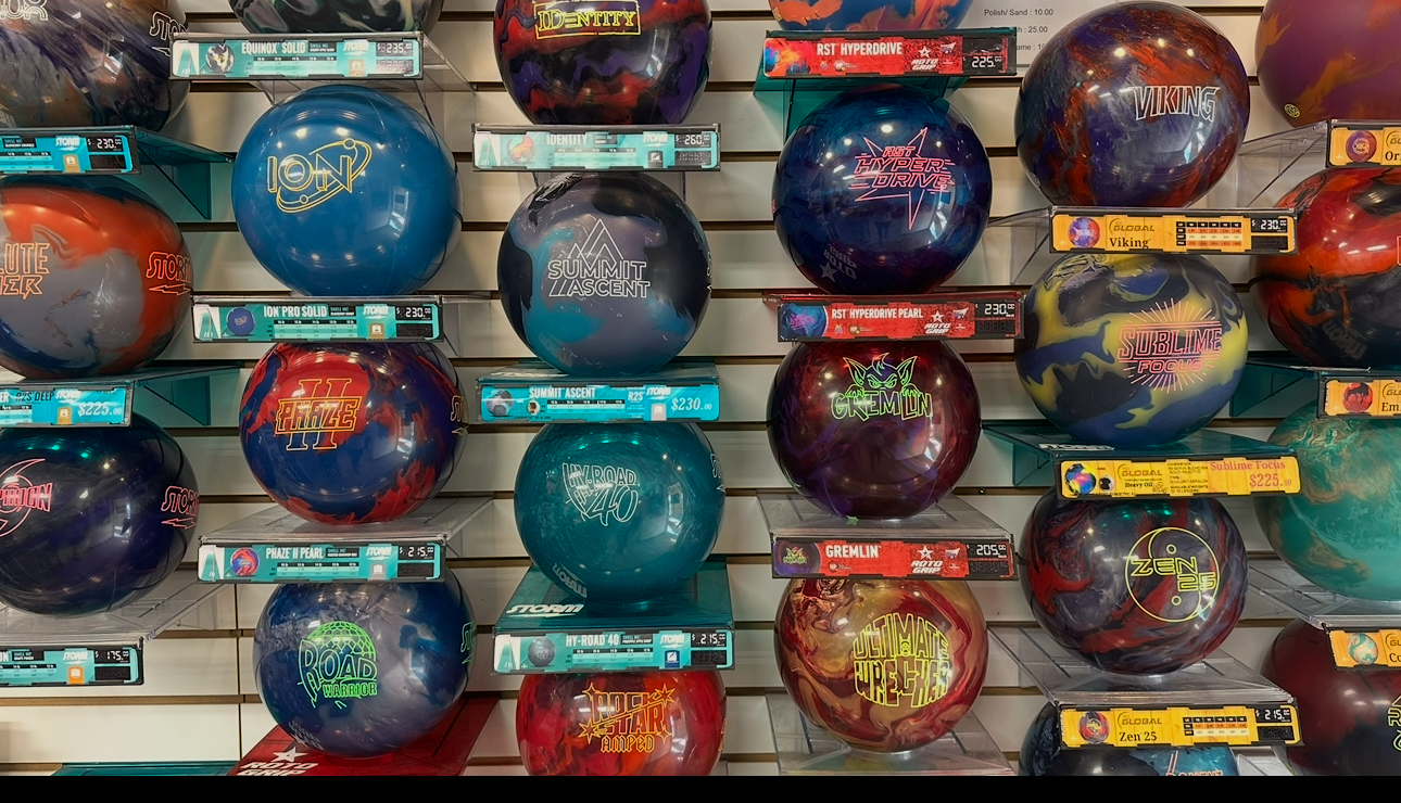 The new-ball rack at Solid 9 Pro Shop — Storm, Roto Grip & 900 Global